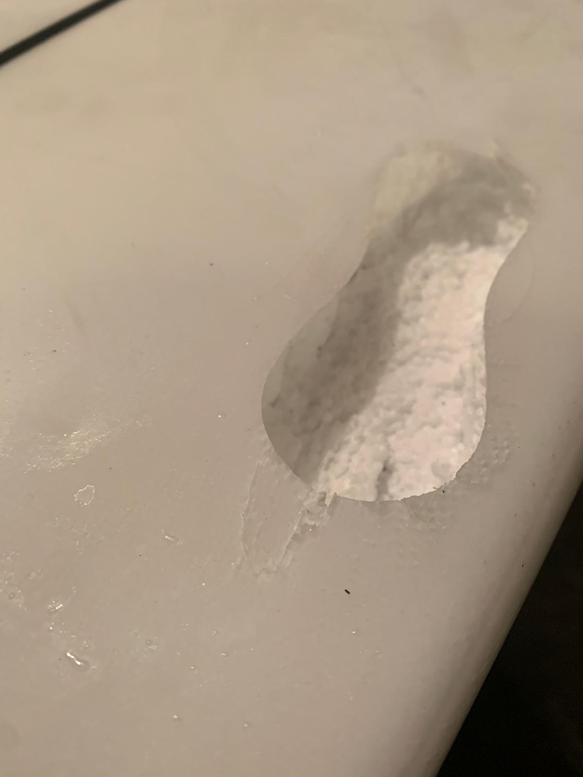 Compressed heel dent in a board deck