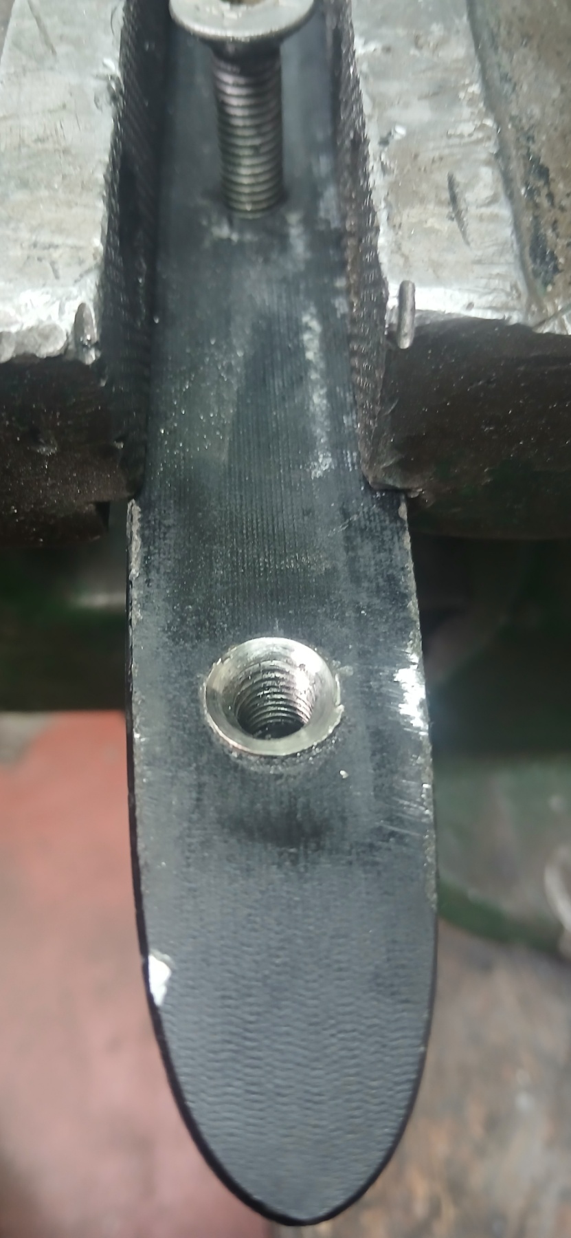Mast fitting retapped and cleaned in the vice